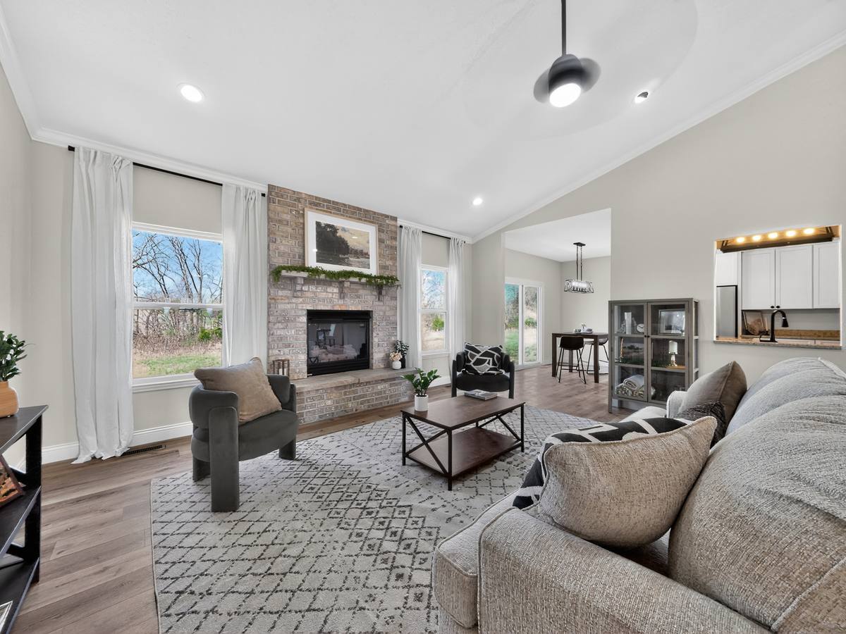 New construction living room with fireplace - real estate photography